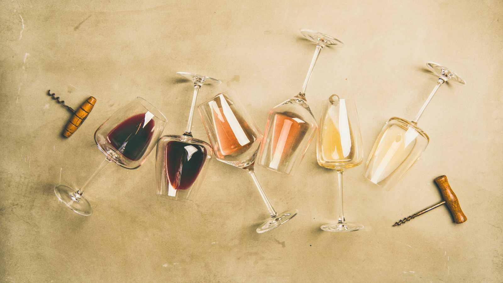 A glass of wine being tasted