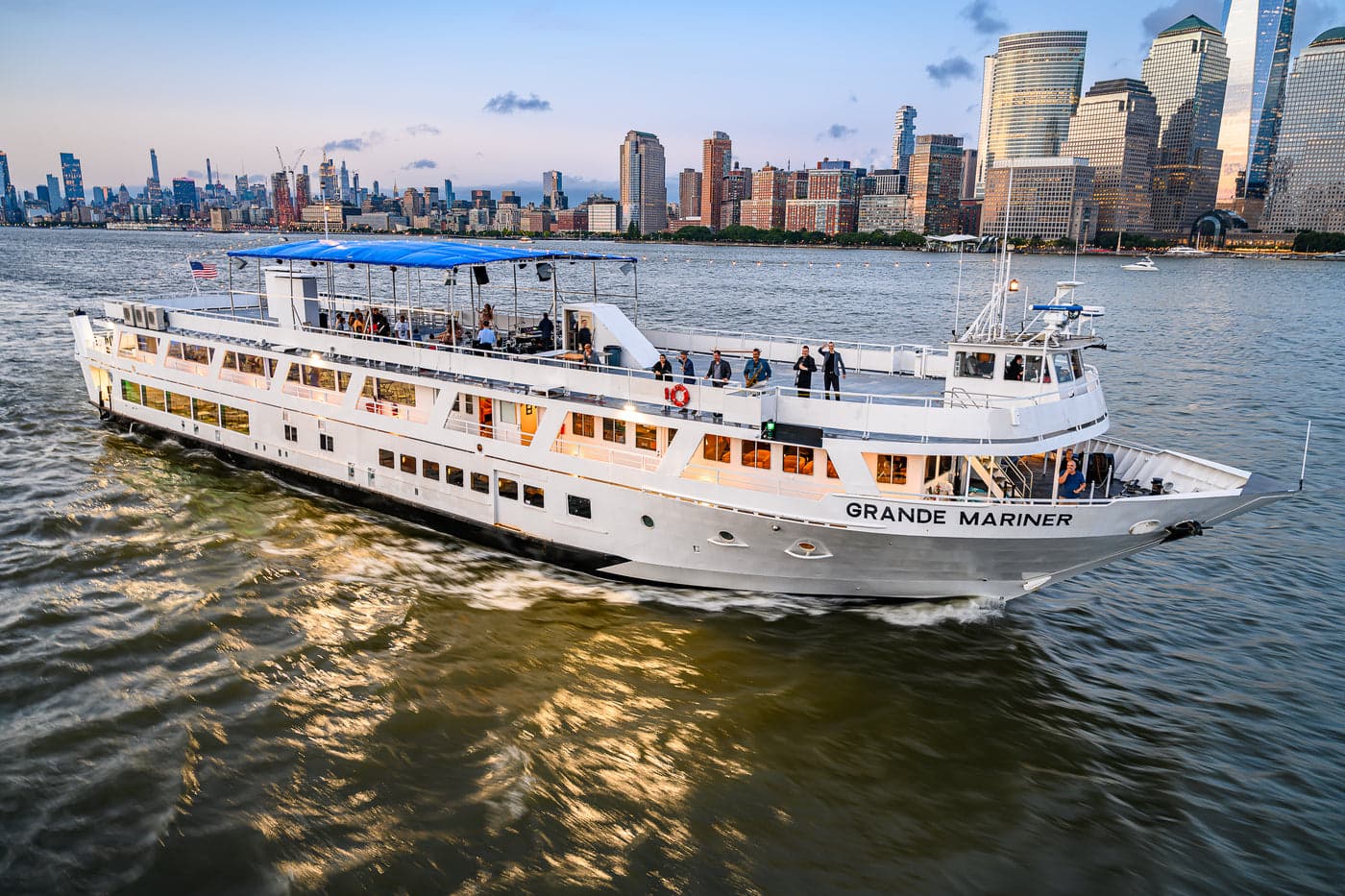 Grande Mariner on the Hudson at golden hour with the lower Manhattan skyline behind